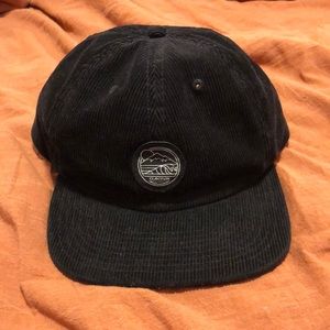 Dakine black corduroy snap back hat
